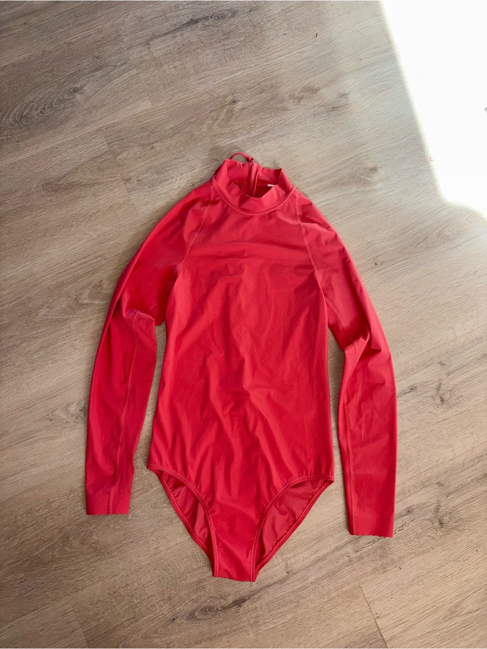 lululemon athletica Long-Sleeve One-Piece Swimsuit in Red
